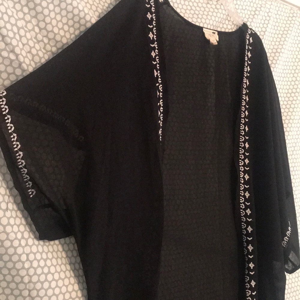 black shawl with aztec pattern in white